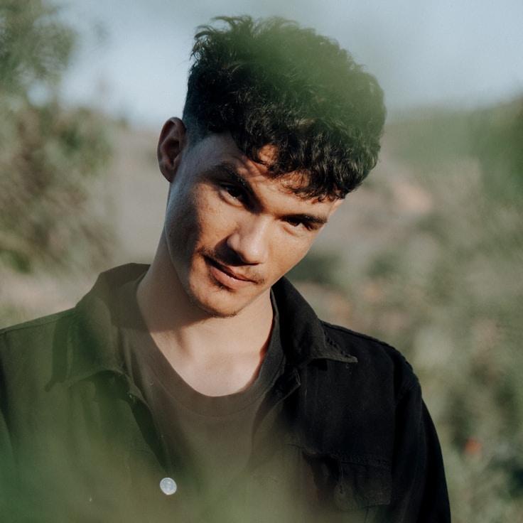 Portrait of Avery, group coordinator and fusion cooking enthusiast